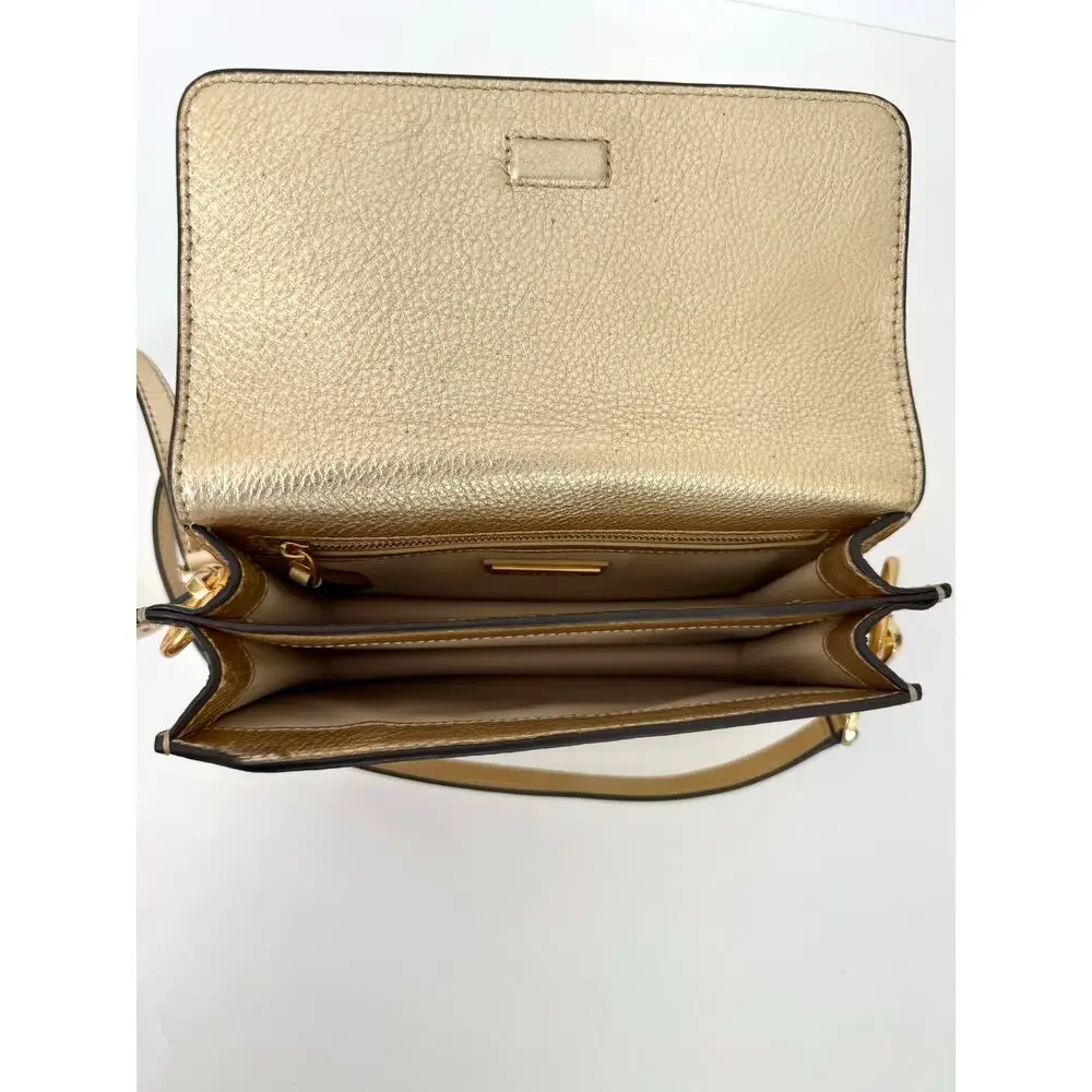 Tory Burch magnetic closure